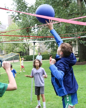 DEAN Navigators campers playing nine square at Sports & Games Camp
