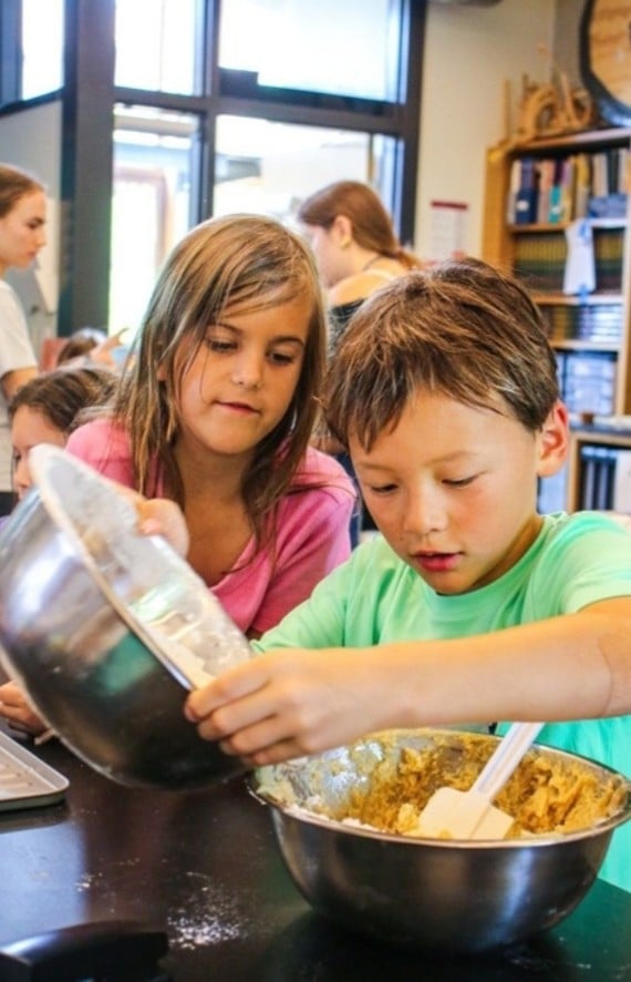 Campers mixing ingredients together in Culinary Arts camp